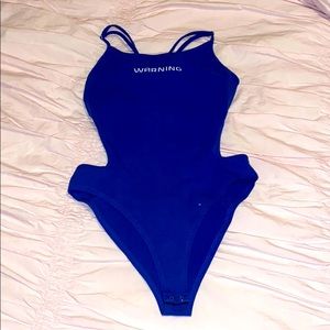 Open back Bodysuit with adjustable straps.